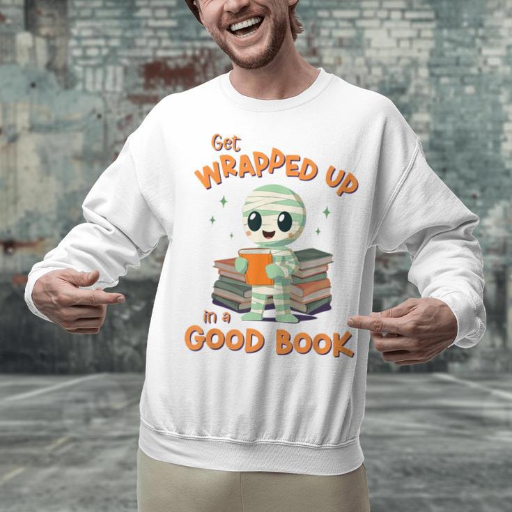 Cute Halloween Teacher Librarian Mummy Reading Books Unisex Sweatshirt, gift for family, gift for coworker Cute Halloween Teacher Librarian Mummy Reading Books Unisex Sweatshirt, gift for family, gift for coworker
