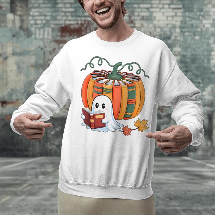 Fall Book Pumpkin Books Ghost Reading Halloween Teacher Unisex Sweatshirt, gift for family, gift for coworker Fall Book Pumpkin Books Ghost Reading Halloween Teacher Unisex Sweatshirt, gift for family, gift for coworker