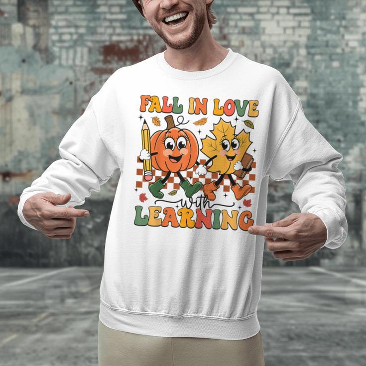 Fall In Love With Learning Thanksgiving Teacher Student Unisex Sweatshirt, gift for family, gift for coworker Fall In Love With Learning Thanksgiving Teacher Student Unisex Sweatshirt, gift for family, gift for coworker