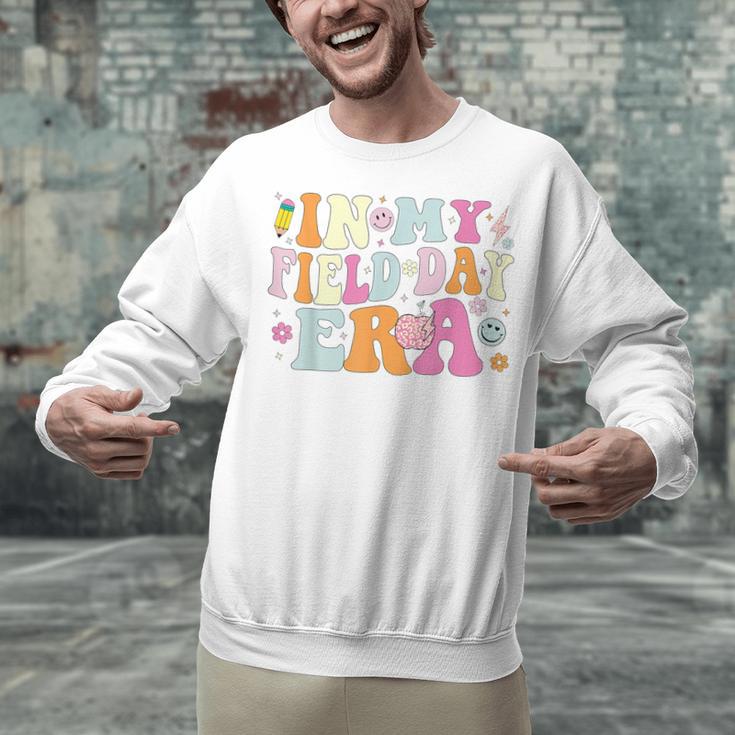 In My Field Day Era Teacher Kids Cute Groovy Field Day Unisex Sweatshirt, Groovy Teacher Sweatshirts, gift for family, gift for coworker In My Field Day Era Teacher Kids Cute Groovy Field Day Unisex Sweatshirt, Groovy Teacher Sweatshirts, gift for family, gift for coworker