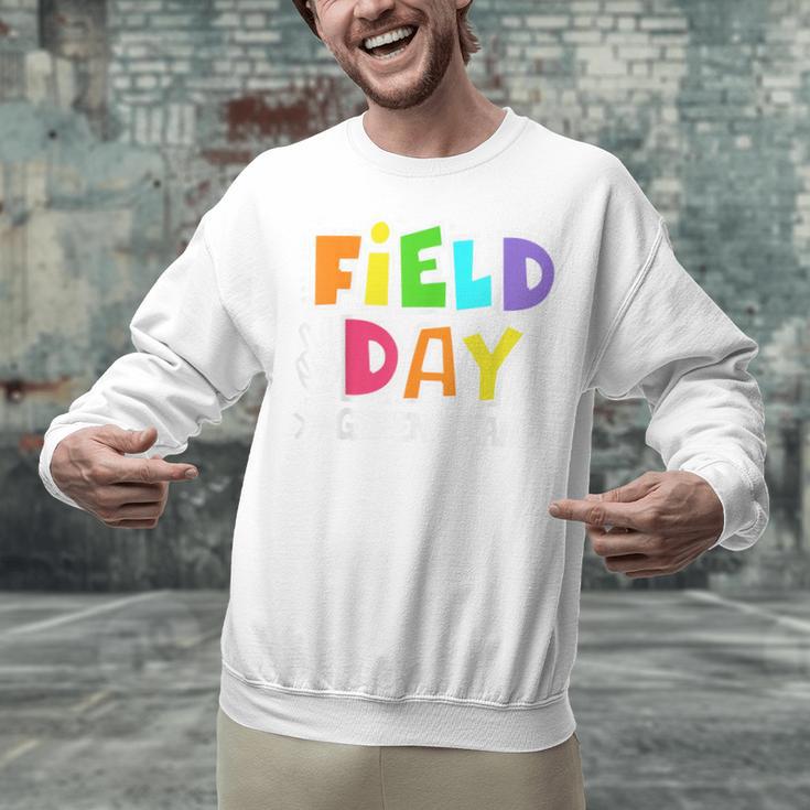 Field Day Green Team For Teacher Kids Field Day Games Unisex Sweatshirt, gift for family, gift for coworker Field Day Green Team For Teacher Kids Field Day Games Unisex Sweatshirt, gift for family, gift for coworker