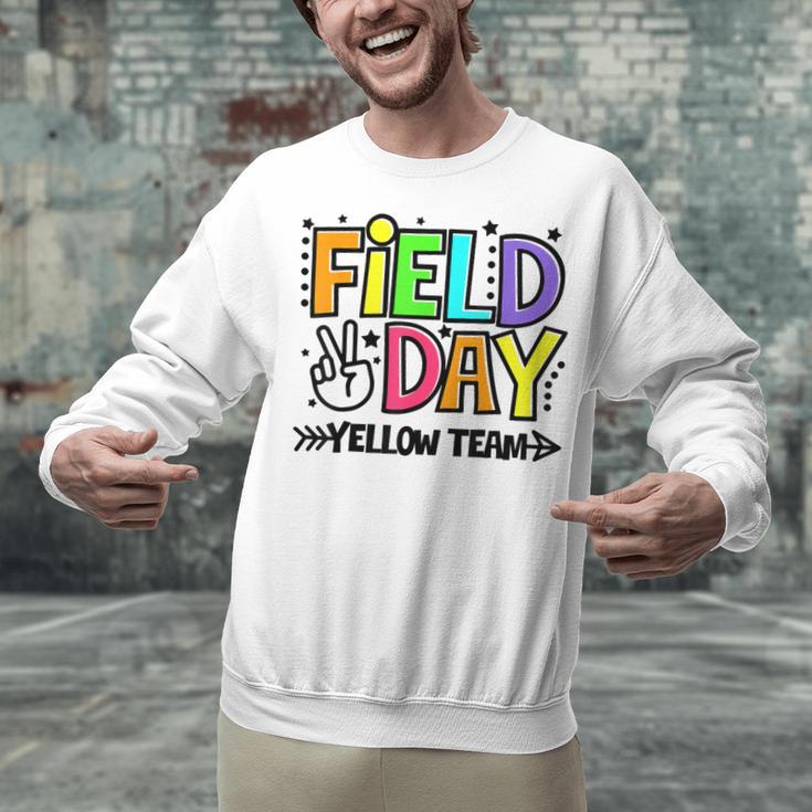 Field Day Yellow Team For Teacher Kids Field Day Games Unisex Sweatshirt, gift for family, gift for coworker Field Day Yellow Team For Teacher Kids Field Day Games Unisex Sweatshirt, gift for family, gift for coworker