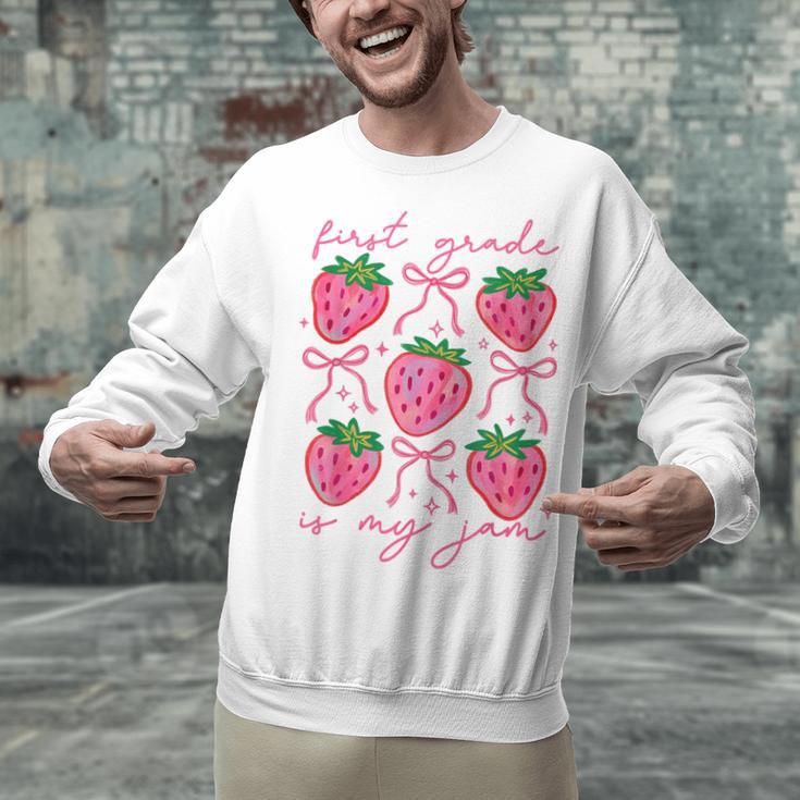 First Grade Is My Jam Strawberry First Grade Teacher Women Unisex Sweatshirt, First Grade Teacher Sweatshirts, gift for family, gift for coworker First Grade Is My Jam Strawberry First Grade Teacher Women Unisex Sweatshirt, First Grade Teacher Sweatshirts, gift for family, gift for coworker