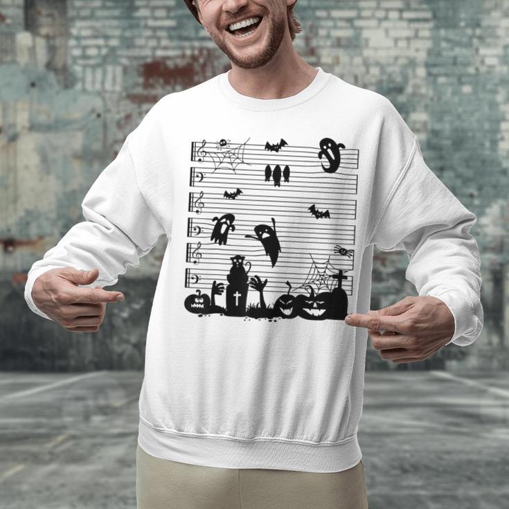 Halloween Music Note Clefs Spooky Ghost For Music Teacher Unisex Sweatshirt, gift for family, gift for coworker Halloween Music Note Clefs Spooky Ghost For Music Teacher Unisex Sweatshirt, gift for family, gift for coworker