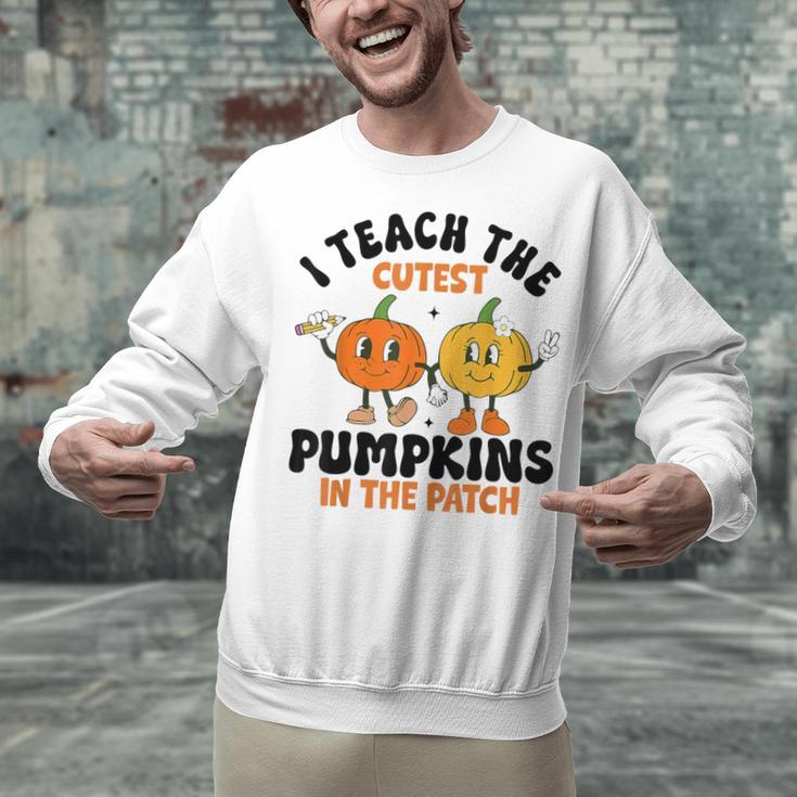 Halloween Teacher I Teach The Cutest Pumpkins In The Patch Unisex Sweatshirt, gift for family, gift for coworker Halloween Teacher I Teach The Cutest Pumpkins In The Patch Unisex Sweatshirt, gift for family, gift for coworker