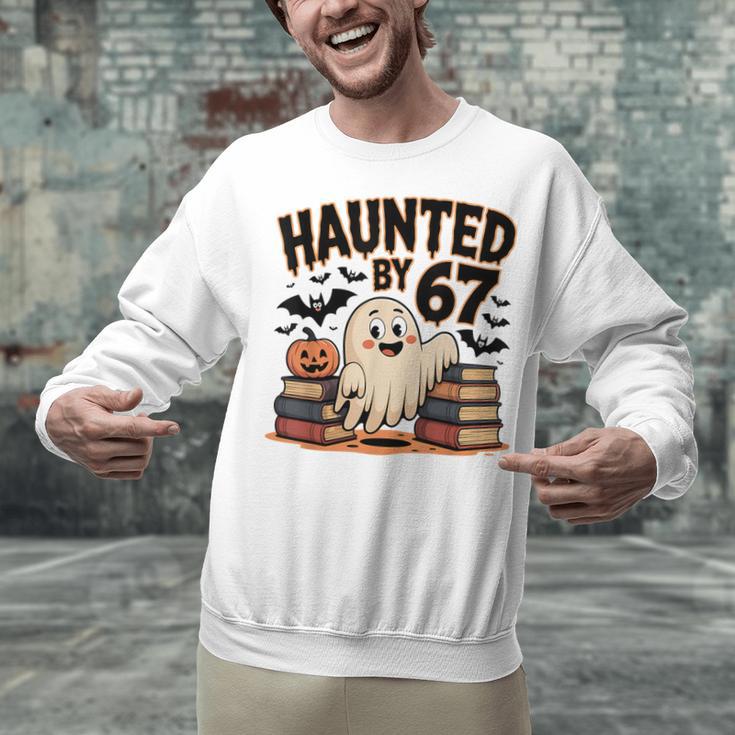 Haunted By 67 Teacher Ghost Pumpkin Halloween Costum Unisex Sweatshirt, gift for family, gift for coworker
