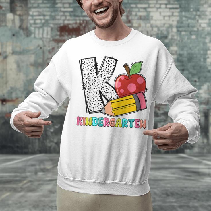 K Is For Kindergarten Teacher Pencil Apple Back To School Unisex Sweatshirt, gift for family, gift for coworker K Is For Kindergarten Teacher Pencil Apple Back To School Unisex Sweatshirt, gift for family, gift for coworker