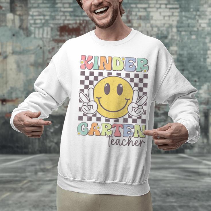 Kindergarten Teacher Team Hippie Smile Face Back To School Unisex Sweatshirt, gift for family, gift for coworker Kindergarten Teacher Team Hippie Smile Face Back To School Unisex Sweatshirt, gift for family, gift for coworker