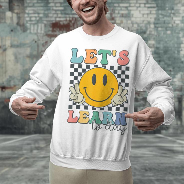 Let's Learn Today Smile Face Back To School For Teacher Kids Unisex Sweatshirt, gift for family, gift for coworker Let's Learn Today Smile Face Back To School For Teacher Kids Unisex Sweatshirt, gift for family, gift for coworker