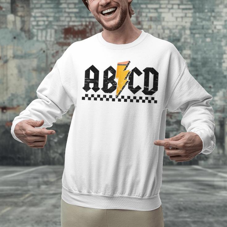 Lightning Pencil Rock'n Roll ABCD Teacher Back To School Kid Unisex Sweatshirt, gift for family, gift for coworker Lightning Pencil Rock'n Roll ABCD Teacher Back To School Kid Unisex Sweatshirt, gift for family, gift for coworker