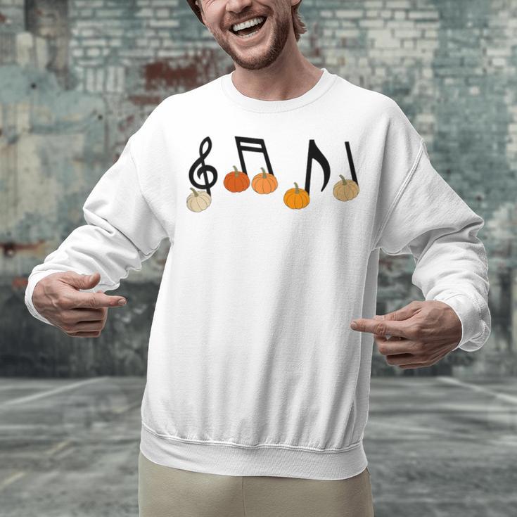 Music Notes Pumpkin Music Teacher Musician Fall Halloween Men Women Kids Unisex Sweatshirt, gift for family, gift for coworker Music Notes Pumpkin Music Teacher Musician Fall Halloween Men Women Kids Unisex Sweatshirt, gift for family, gift for coworker