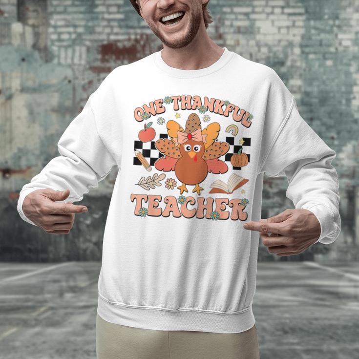 One Thankful Teacher Thanksgiving Retro Groovy Fall Teachers Unisex Sweatshirt, Groovy Teacher Sweatshirts, gift for family, gift for coworker