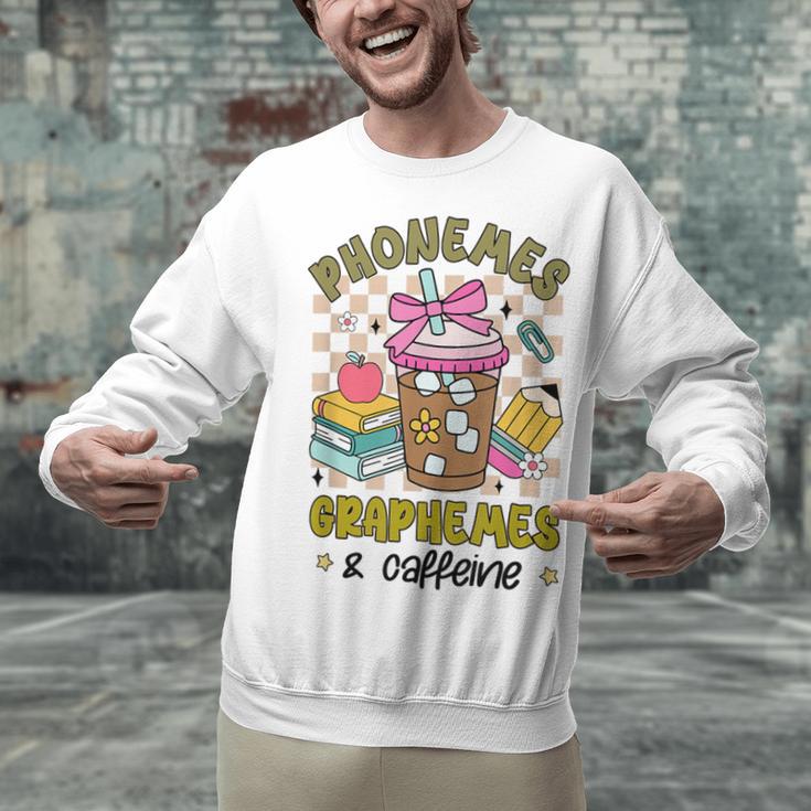 Phonemes Graphemes Caffeine Back To School Reading Teacher Unisex Sweatshirt, gift for family, gift for coworker