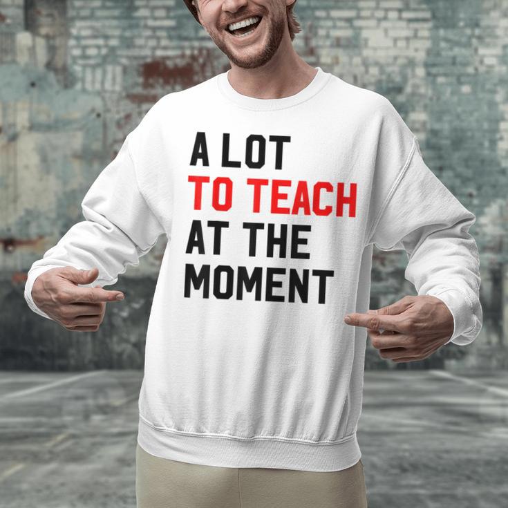 Quote A Lot To Teach At The Moment Teacher Women Unisex Sweatshirt, gift for family, gift for coworker Quote A Lot To Teach At The Moment Teacher Women Unisex Sweatshirt, gift for family, gift for coworker