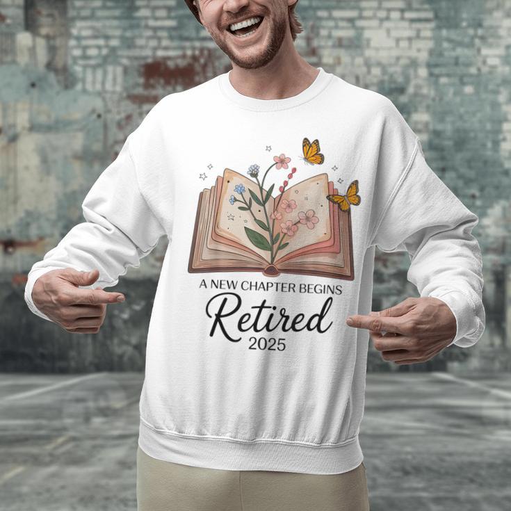 Retired 2025 A New Chapter Begins Retirement Teacher Book Unisex Sweatshirt, gift for family, gift for coworker