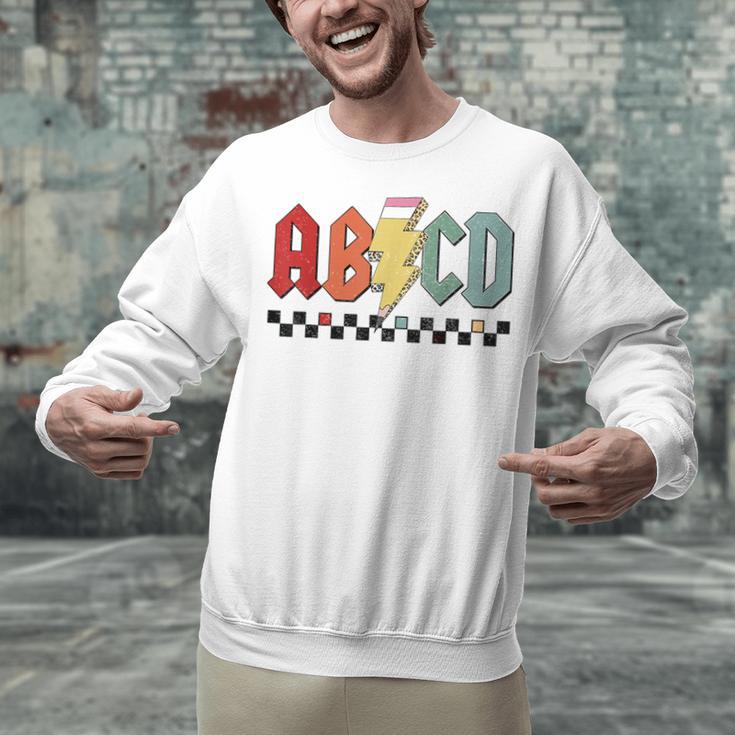 Rock Abcd Back To School Abcd Preschool Teacher Appreciation Unisex Sweatshirt, gift for family, gift for coworker Rock Abcd Back To School Abcd Preschool Teacher Appreciation Unisex Sweatshirt, gift for family, gift for coworker
