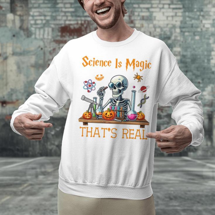 Science Is Magic Halloween Skeleton Students Teacher Unisex Sweatshirt, Science Teacher Sweatshirts, gift for family, gift for coworker Science Is Magic Halloween Skeleton Students Teacher Unisex Sweatshirt, Science Teacher Sweatshirts, gift for family, gift for coworker
