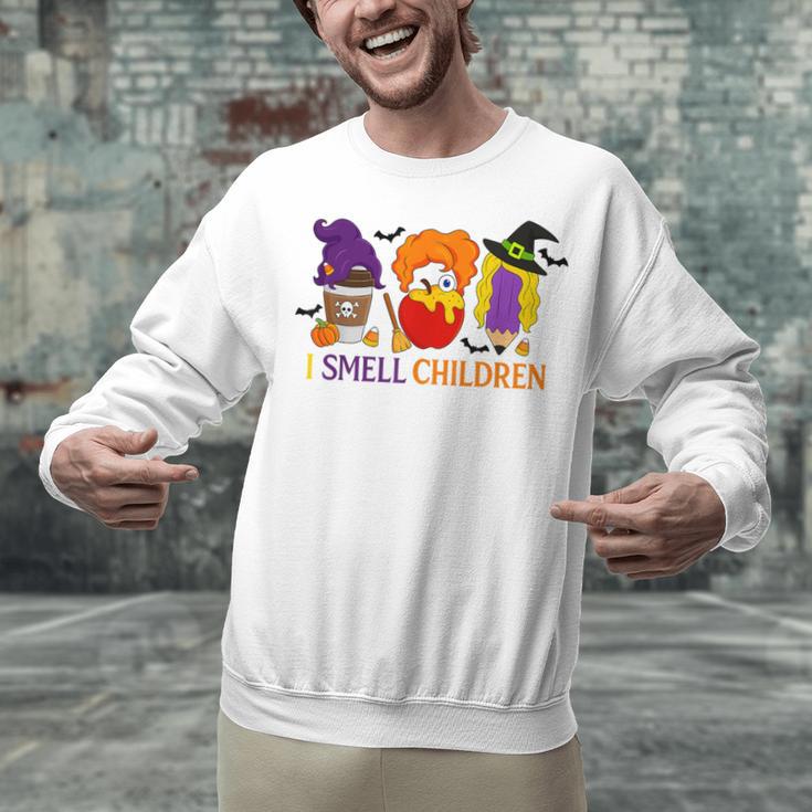 I Smell Children Witch Teacher Halloween Trick Or Teach Unisex Sweatshirt, gift for family, gift for coworker I Smell Children Witch Teacher Halloween Trick Or Teach Unisex Sweatshirt, gift for family, gift for coworker