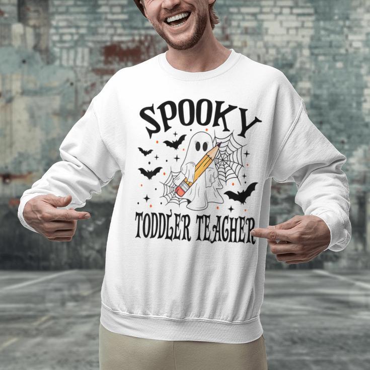 Spooky Toddler Teacher Halloween School Unisex Sweatshirt, gift for family, gift for coworker Spooky Toddler Teacher Halloween School Unisex Sweatshirt, gift for family, gift for coworker