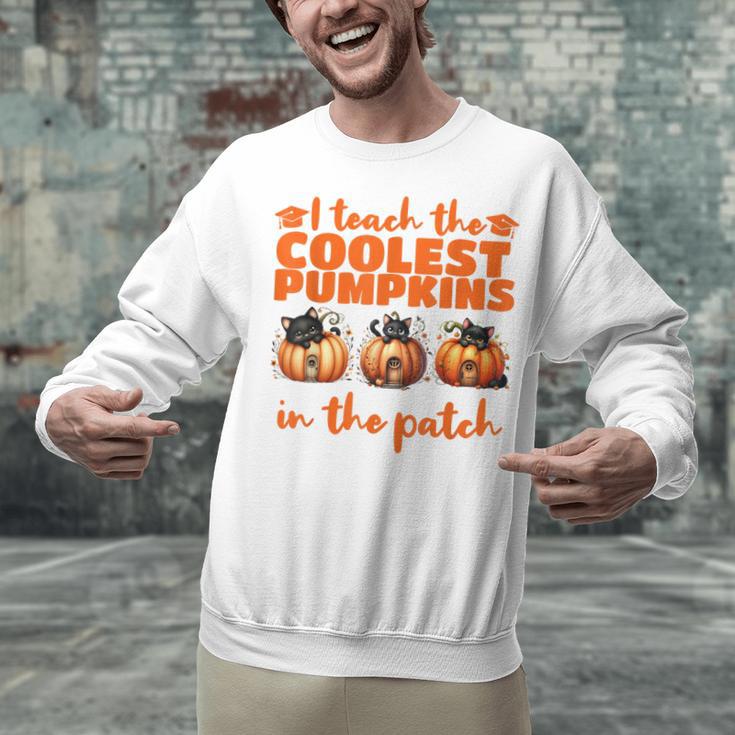 I Teach The Cutest Pumpkins Halloween Teacher Cat Lover Unisex Sweatshirt, gift for family, gift for coworker I Teach The Cutest Pumpkins Halloween Teacher Cat Lover Unisex Sweatshirt, gift for family, gift for coworker
