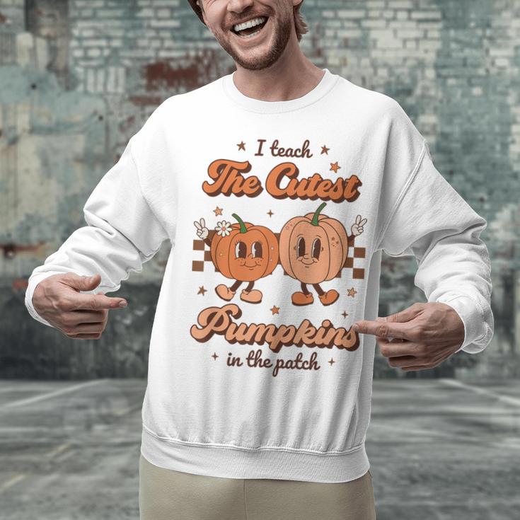I Teach The Cutest Pumpkins In The Patch Retro Teacher Fall Unisex Sweatshirt, gift for family, gift for coworker I Teach The Cutest Pumpkins In The Patch Retro Teacher Fall Unisex Sweatshirt, gift for family, gift for coworker