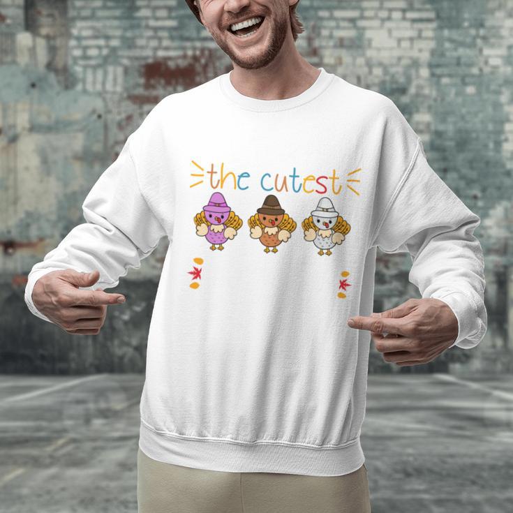 I Teach The Cutest Turkeys School Teachers Thanksgiving Unisex Sweatshirt, gift for family, gift for coworker I Teach The Cutest Turkeys School Teachers Thanksgiving Unisex Sweatshirt, gift for family, gift for coworker