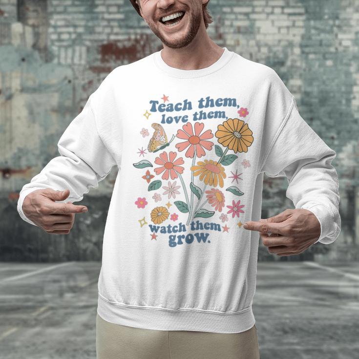 Teach Them Love Them Watch Them Grow Retro Teacher Floral Unisex Sweatshirt, gift for family, gift for coworker