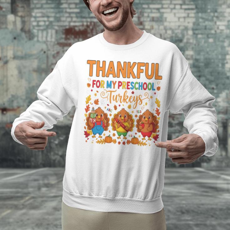 Teach Thanksgiving Teacher Thankful For My Preschool Turkeys Unisex Sweatshirt, gift for family, gift for coworker Teach Thanksgiving Teacher Thankful For My Preschool Turkeys Unisex Sweatshirt, gift for family, gift for coworker