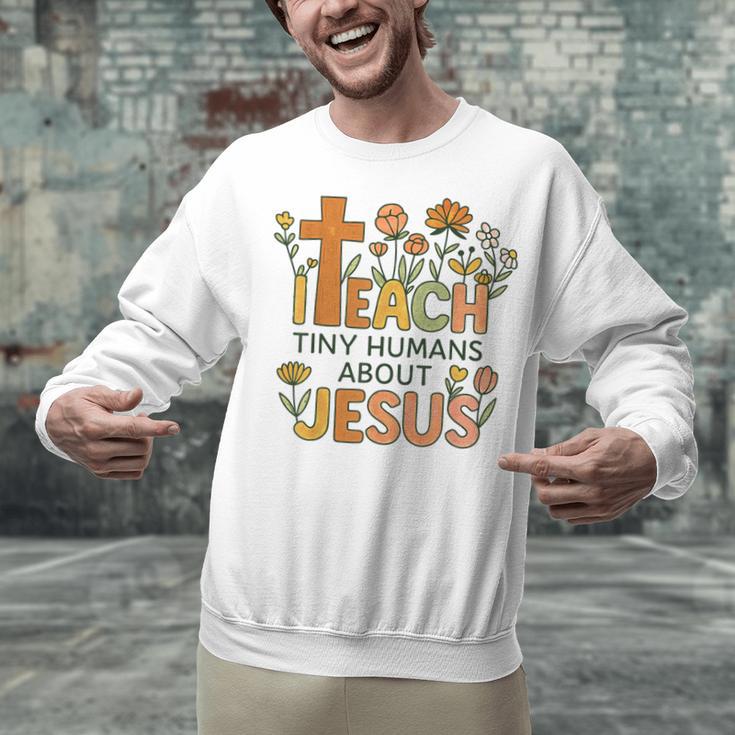I Teach Tiny Humans About Jesus Christian Teacher Religious Unisex Sweatshirt, gift for family, gift for coworker I Teach Tiny Humans About Jesus Christian Teacher Religious Unisex Sweatshirt, gift for family, gift for coworker