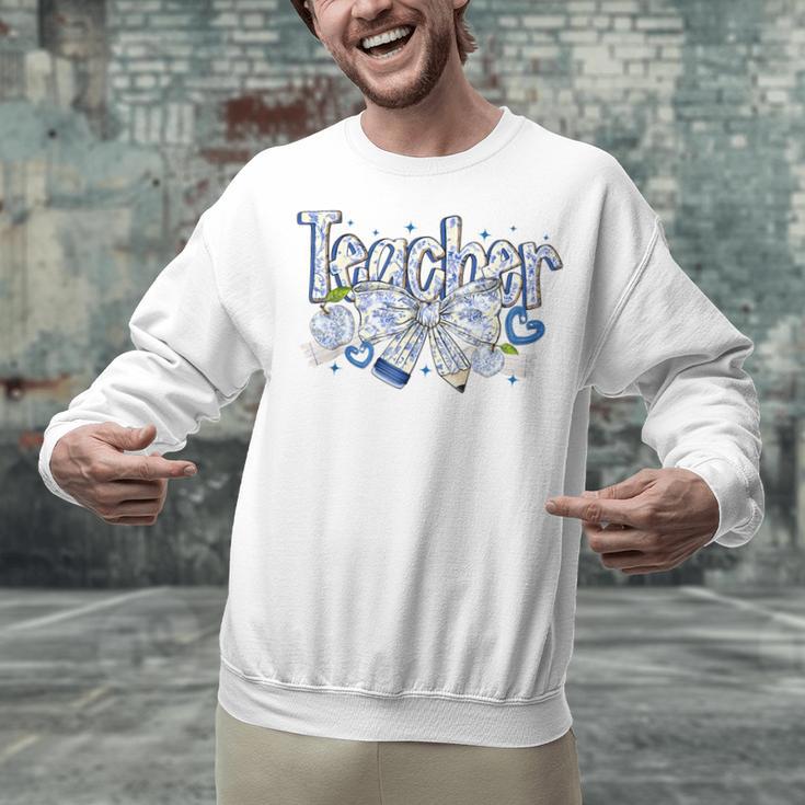 Teacher Blue Chinoiserie Coquette Bow Heart Teacher Life Unisex Sweatshirt, gift for family, gift for coworker Teacher Blue Chinoiserie Coquette Bow Heart Teacher Life Unisex Sweatshirt, gift for family, gift for coworker
