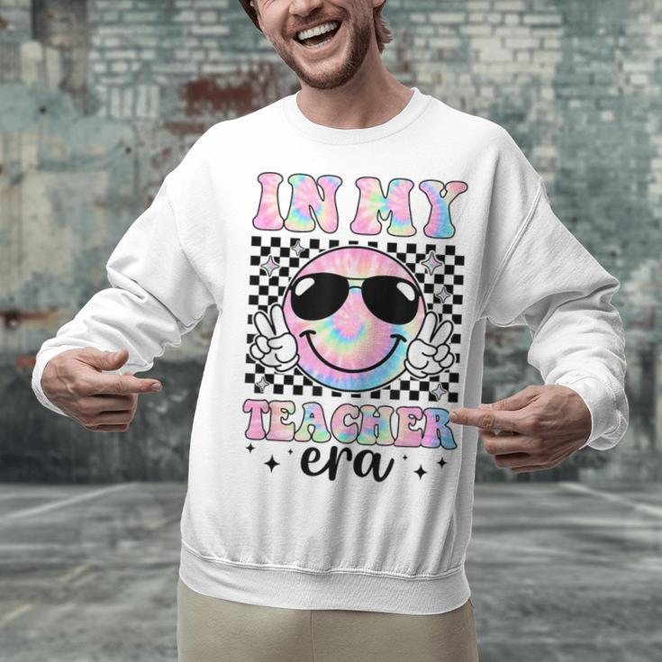 In My Teacher Era Groovy Tie Dye Back To School Cute Teacher Unisex Sweatshirt, Groovy Teacher Sweatshirts, gift for family, gift for coworker In My Teacher Era Groovy Tie Dye Back To School Cute Teacher Unisex Sweatshirt, Groovy Teacher Sweatshirts, gift for family, gift for coworker