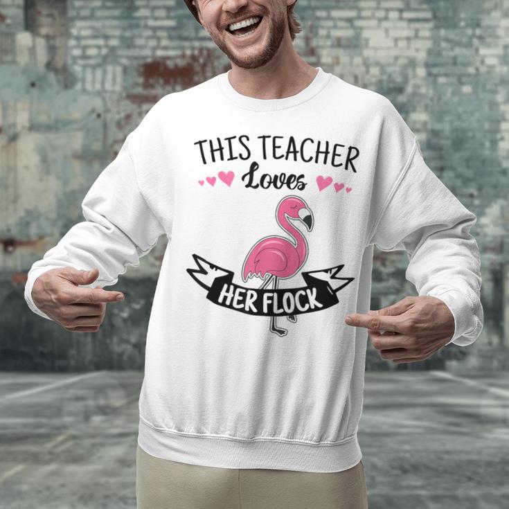 This Teacher Loves Her Flock Cute Flamingo Teacher Unisex Sweatshirt, gift for family, gift for coworker This Teacher Loves Her Flock Cute Flamingo Teacher Unisex Sweatshirt, gift for family, gift for coworker