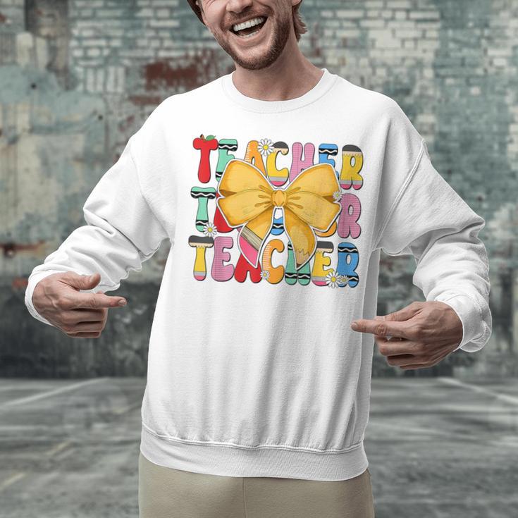 Teacher Pencil Coquette Bow Back To School Teacher Unisex Sweatshirt, gift for family, gift for coworker Teacher Pencil Coquette Bow Back To School Teacher Unisex Sweatshirt, gift for family, gift for coworker