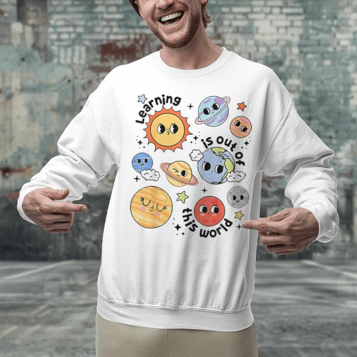 Teacher Space Science Learning Is Out Of World Solar System Unisex Sweatshirt, Science Teacher Sweatshirts, gift for family, gift for coworker Teacher Space Science Learning Is Out Of World Solar System Unisex Sweatshirt, Science Teacher Sweatshirts, gift for family, gift for coworker