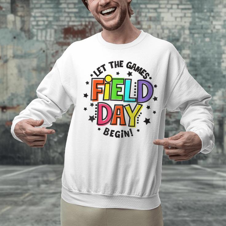 Teacher Student Field Day Let The Games Begin Field Day Unisex Sweatshirt, gift for family, gift for coworker Teacher Student Field Day Let The Games Begin Field Day Unisex Sweatshirt, gift for family, gift for coworker