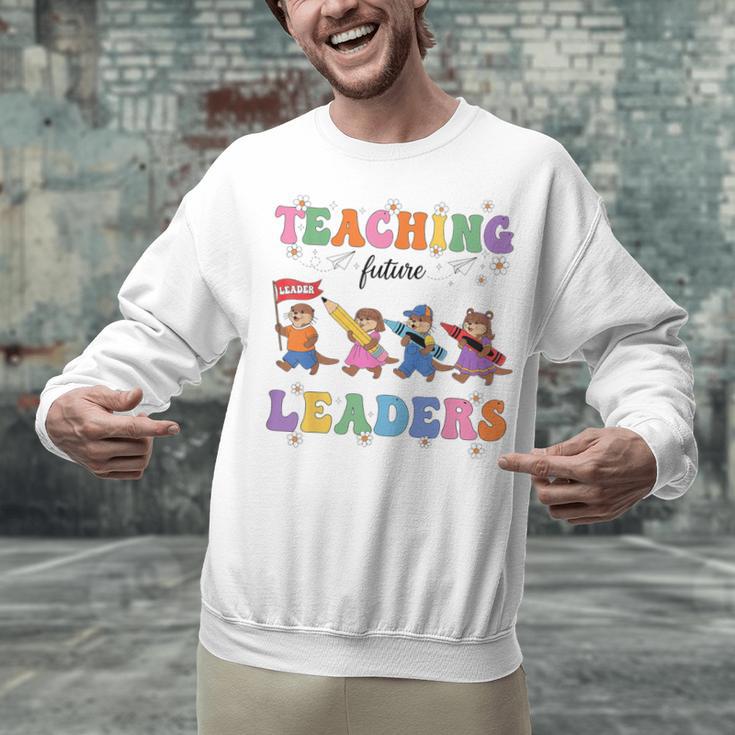 Teaching Future Leaders Otter Back To School Teacher Unisex Sweatshirt, Future Teacher Sweatshirts, gift for family, gift for coworker