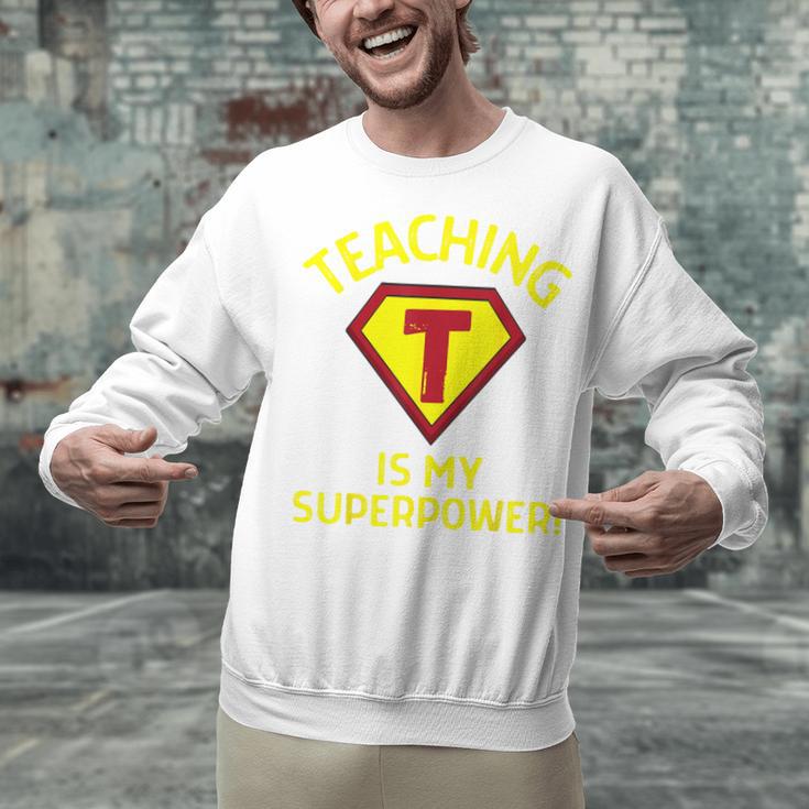 Teaching Is My Superpower Fun Elementary Teacher 1st Grade Unisex Sweatshirt, gift for family, gift for coworker Teaching Is My Superpower Fun Elementary Teacher 1st Grade Unisex Sweatshirt, gift for family, gift for coworker