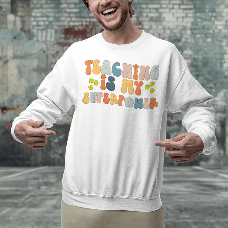 Teaching Is My Superpower Vintage Groovy University Teacher Unisex Sweatshirt, Groovy Teacher Sweatshirts, gift for family, gift for coworker