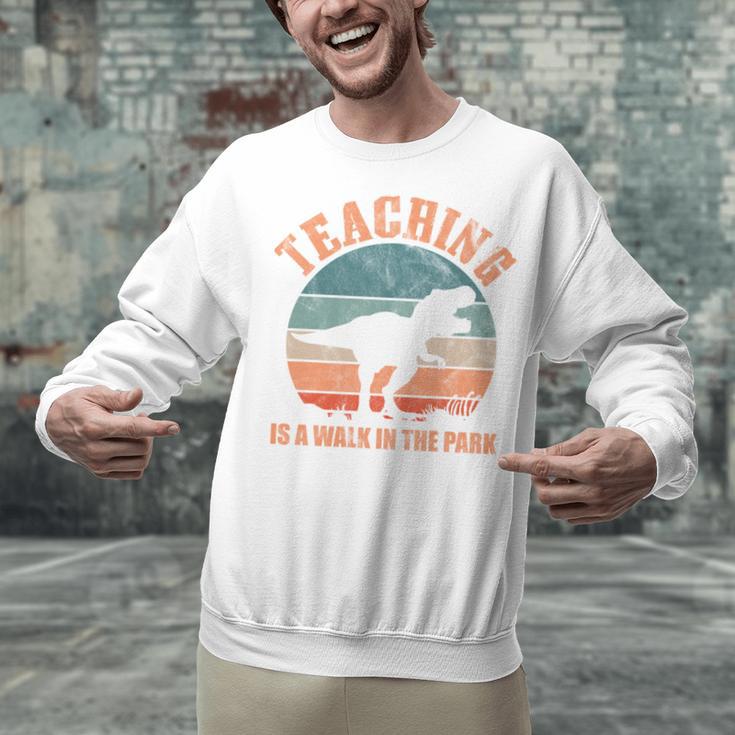 Teaching Is A Walk In The Park Teacher T-Rex Retro Unisex Sweatshirt, gift for family, gift for coworker