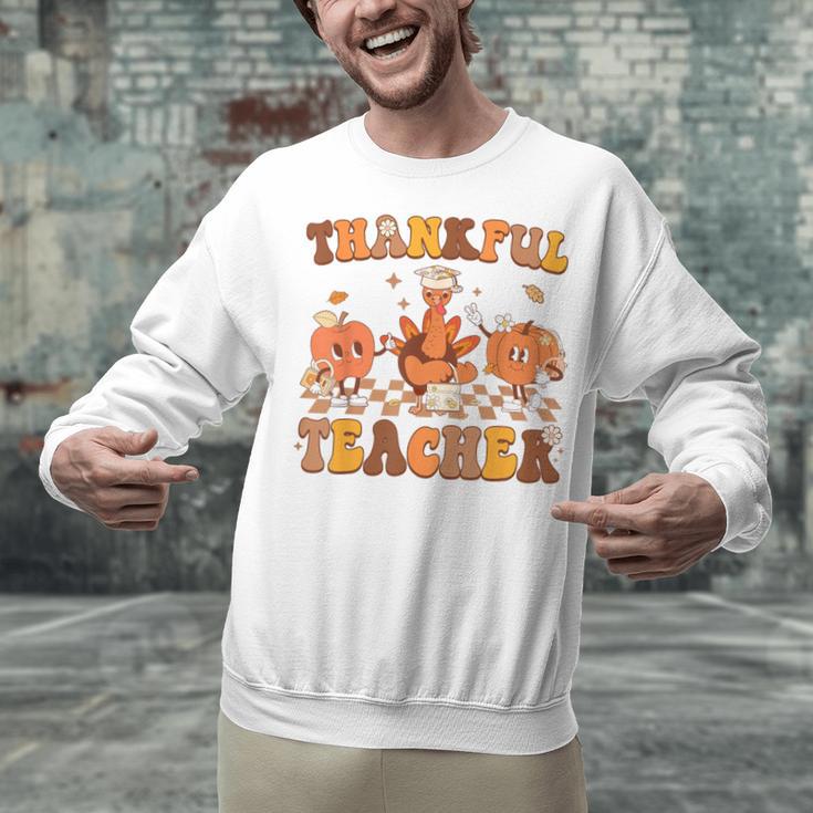 Thankful Teacher Retro Groovy Thanksgiving Fall Women Men Unisex Sweatshirt, Groovy Teacher Sweatshirts, gift for family, gift for coworker