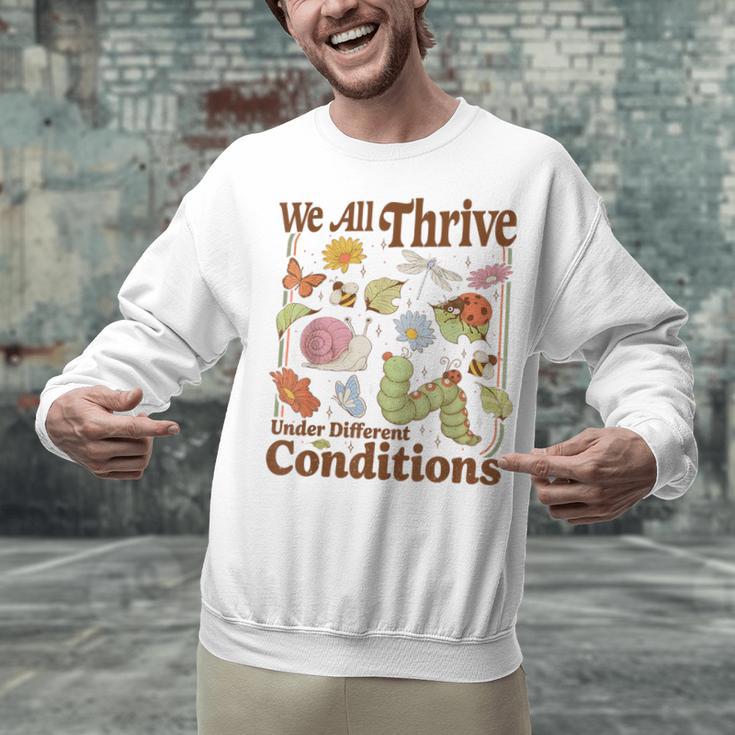 We All Thrive Under Different Conditions SPED Teacher Unisex Sweatshirt, gift for family, gift for coworker We All Thrive Under Different Conditions SPED Teacher Unisex Sweatshirt, gift for family, gift for coworker
