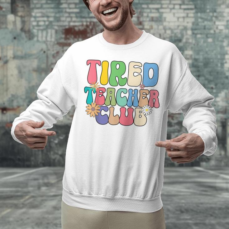 Tired Teachers Club Groovy Teachers Back To School Unisex Sweatshirt, gift for family, gift for coworker Tired Teachers Club Groovy Teachers Back To School Unisex Sweatshirt, gift for family, gift for coworker
