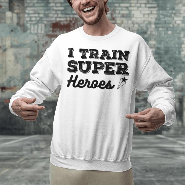I Train Superheroes For Teacher Coach Men Women Unisex Sweatshirt, gift for family, gift for coworker