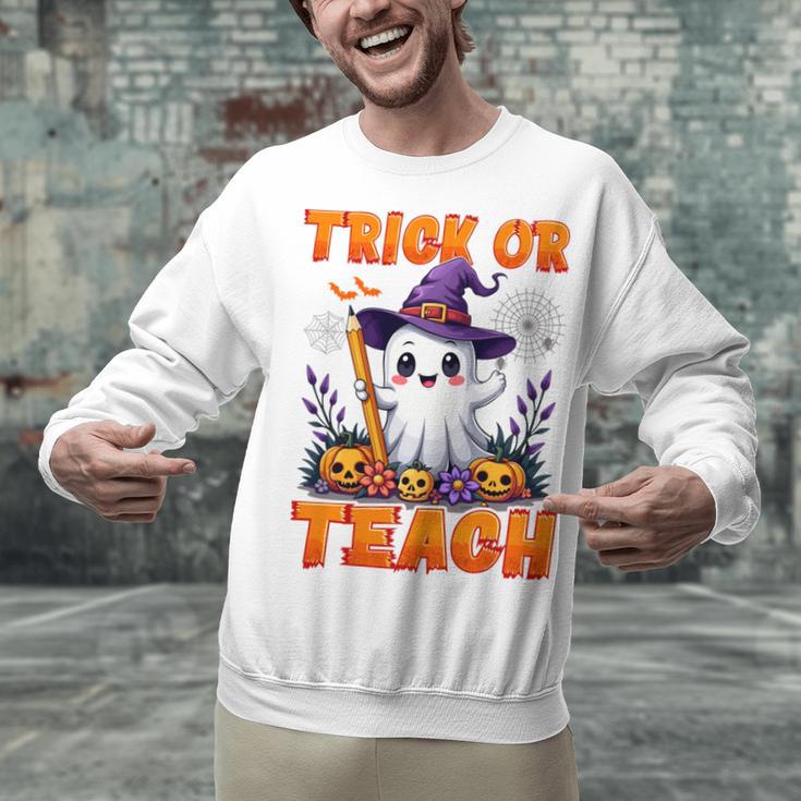 Trick Or Teach Teacher Halloween Ghost Pencil Floral Unisex Sweatshirt, gift for family, gift for coworker