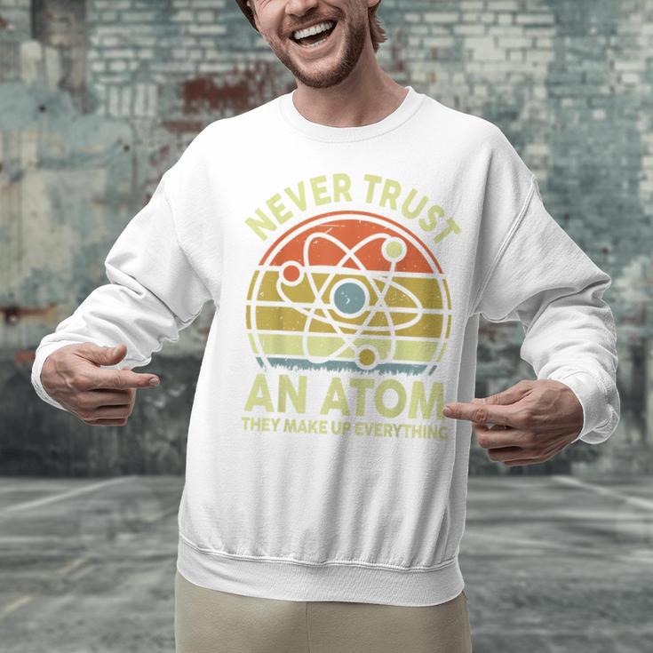 Never Trust An Atom Physics Jokes Science Teacher Unisex Sweatshirt, Science Teacher Sweatshirts, gift for family, gift for coworker Never Trust An Atom Physics Jokes Science Teacher Unisex Sweatshirt, Science Teacher Sweatshirts, gift for family, gift for coworker