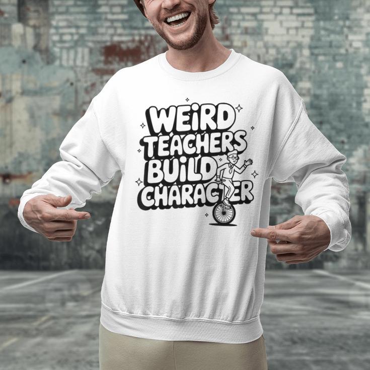 Weird Teachers Build Character School Pun Unisex Sweatshirt, gift for family, gift for coworker Weird Teachers Build Character School Pun Unisex Sweatshirt, gift for family, gift for coworker