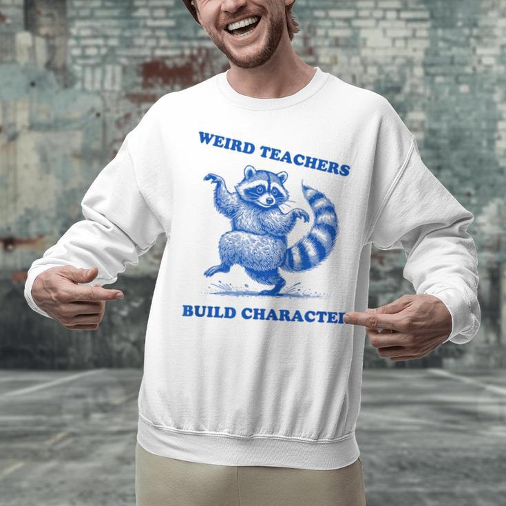 Weird Teachers Build Character Shirt Raccoon Dancing Unisex Sweatshirt, gift for family, gift for coworker Weird Teachers Build Character Shirt Raccoon Dancing Unisex Sweatshirt, gift for family, gift for coworker