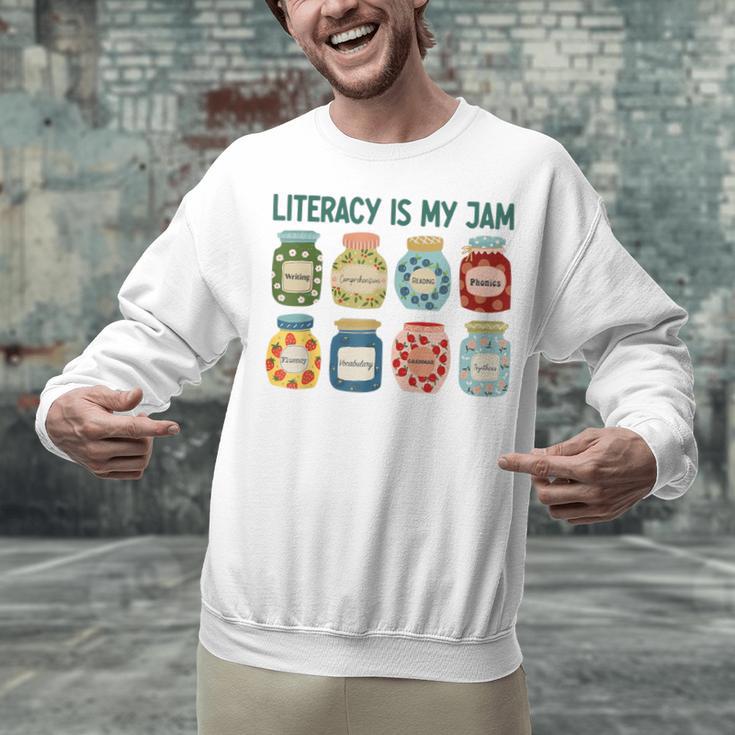 Women Literacy Is My Jam Literacy Teacher Reading Teacher Unisex Sweatshirt, gift for family, gift for coworker