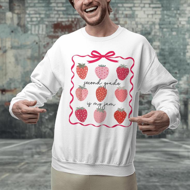 Women Second Grade Is My Jam Strawberry First Kids Teacher Unisex Sweatshirt, First Grade Teacher Sweatshirts, gift for family, gift for coworker Women Second Grade Is My Jam Strawberry First Kids Teacher Unisex Sweatshirt, First Grade Teacher Sweatshirts, gift for family, gift for coworker