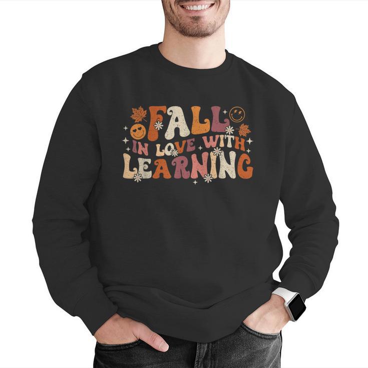Fall In Love With Learning Autum Thanksgiving Teacher Kids Men Graphic Sweatshirt, funny gift
